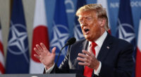 Trump renews Greenland threats at NATO summit, says U.S. could remove troops from Europe